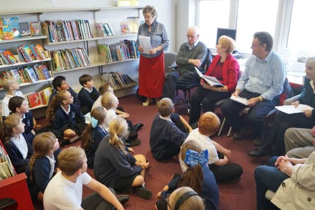 Members of the West Wold Writers group entertained pupils from Eagles Class with their Lincolnshire-themed stories and poems to mark Lincolnshie day EMN-180110-080934001