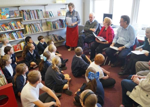 Members of the West Wold Writers group entertained pupils from Eagles Class with their Lincolnshire-themed stories and poems to mark Lincolnshie day EMN-180110-080934001