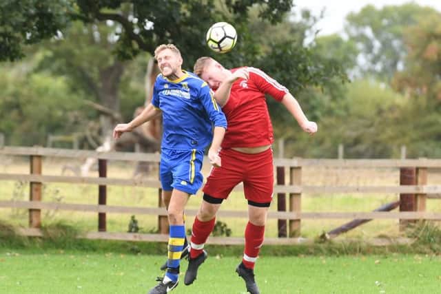 Carrington (blue) v Fishtoft (red). Neil Allen (blue), Adam Vinters (red)