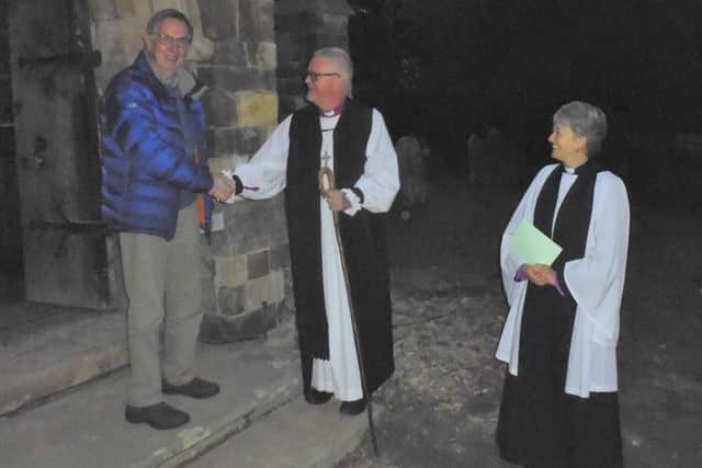 The Bishop and the Rev Sam Parsons greet Brian Wookey of Thimbleby after the service. Picture: Bob Wayne.