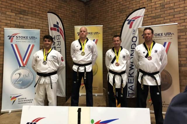 Simon Newby on the podium.