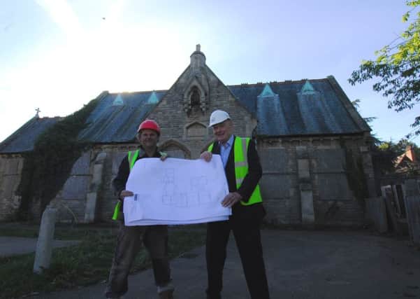 Neil Lowdon of Sankate Homes and Coun John Money, NKDC executive member for housing and property service, with floor plans of the development project for the old Quarrington School. EMN-180925-101944001