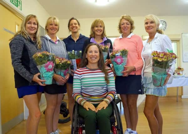 Liz McTernan with the ladies tennis winners EMN-180925-110319001
