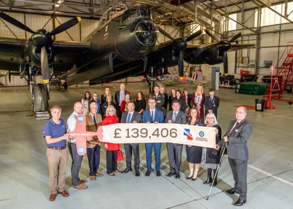 A scene from Lincolnshire Co-op's presentation of funds to the RAF Benevolent Fund and Royal British Legion.