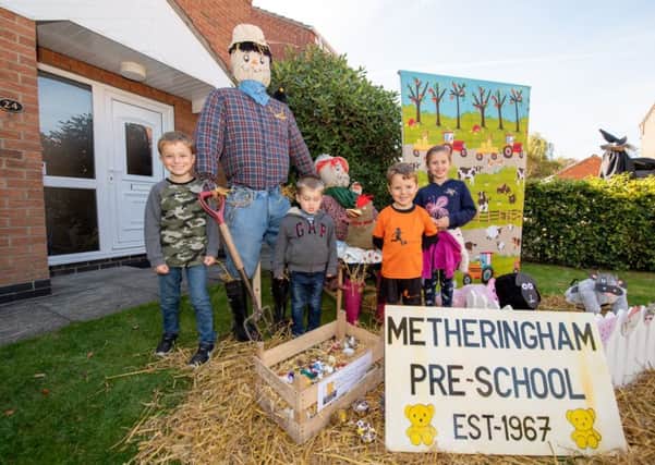Ava Foster, age seven, Bradley Buckberry age six, Freddie Foster, age three, and Elliot Buckberry, age 3 at the Metheringham Pre-School scarecrow display. EMN-180110-123339001