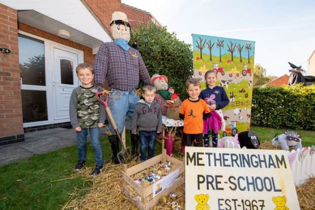 Ava Foster, age seven, Bradley Buckberry age six, Freddie Foster, age three, and Elliot Buckberry, age 3 at the Metheringham Pre-School scarecrow display. EMN-180110-123339001