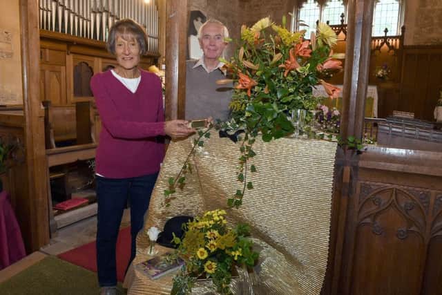 Norman and Barbara Banfield with Barbara's display.