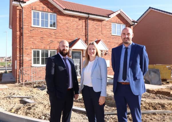 From left, LHP development manager Ben Radley, LHP home ownership manager Sarah Smaller and LHP head of asset management Martin Woods at the new homes. EMN-180927-120242001
