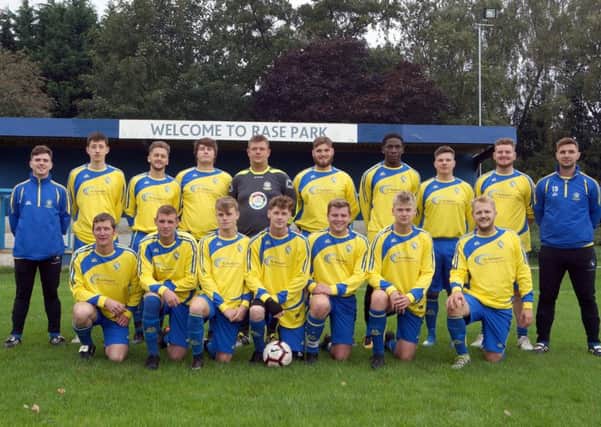 Market Rasen FC pictured in the new kit, sponsored by Lancaster Butchers and NB Law with new joint team managers Thom Lingard and Ian Smith EMN-180927-155824002
