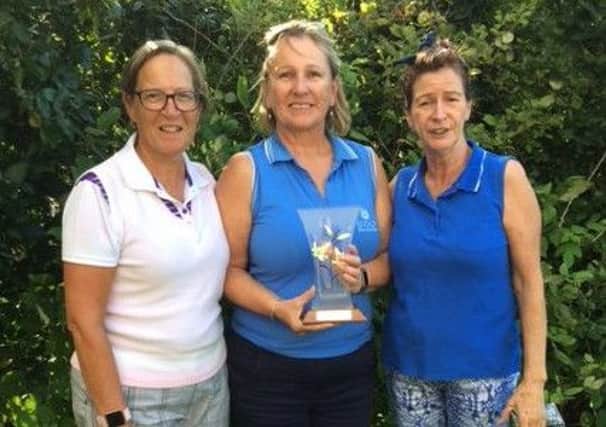 Karen Smith Memorial Trophy winner Carole Craven with Nicki Templeton (left) and lady captain Pam Hayden (right)