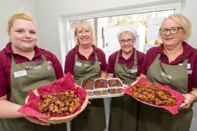 Some of the women from the Bake House team now taking orders for Christmas cakes. EMN-180110-123945001
