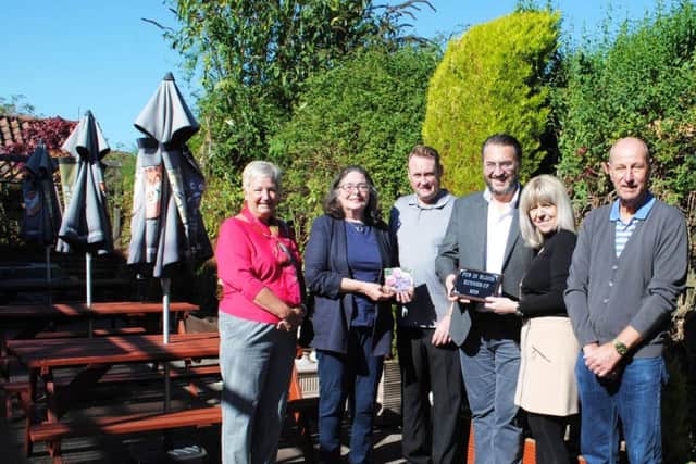 Runner-up Coach and Horses, from left, Bridget Sykes, Alison Fairman, landlord John O'Connor, Kevin Charity, landlady Linda Webster and Paul Collingwood.