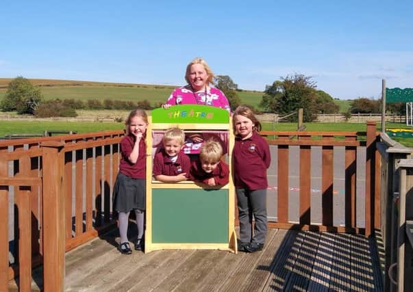 Pupils at Partney Church of England Aided Primary School are enjoying a new outdoor stage area since returning after the summer holidays - just one of the changes that have taken place. ANL-180110-163451001