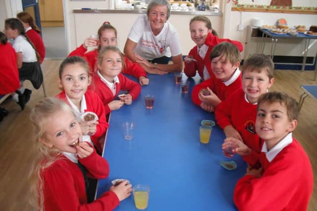 St Andrews School Leasingham pupils joining in the coffee morning in aid of Children with Cancer UK. EMN-180110-163019001