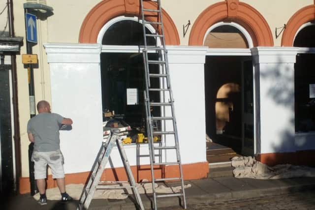 Contractors are in the process of converting the former Achurch & Sons building.