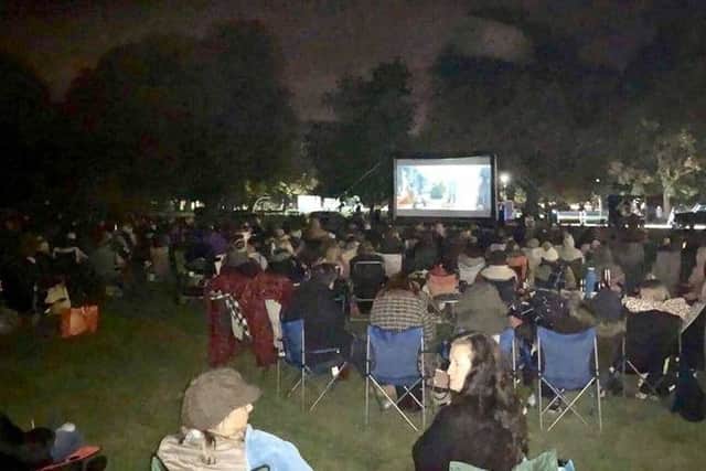 Crowds on the Boston Road Recreation Ground for the open air cinema. EMN-180210-144322001