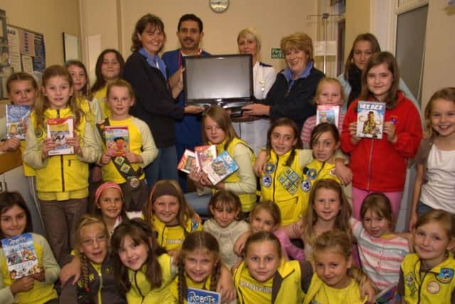 2nd Skegness Brownies making their donation to Skegness Hospital 10 years ago.