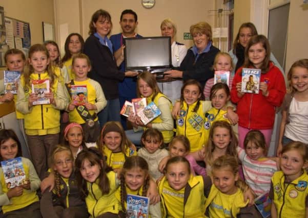 2nd Skegness Brownies making their donation to Skegness Hospital 10 years ago.