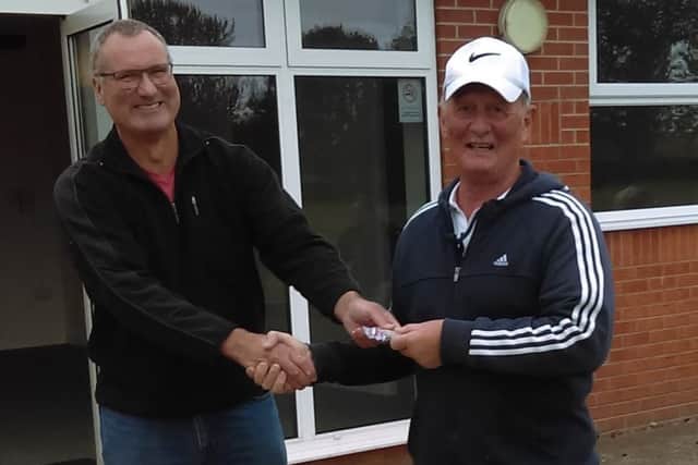 Ian Prescott presents Pete Shaw with his medal for winning the VI class at Lincoln EMN-180310-165735002