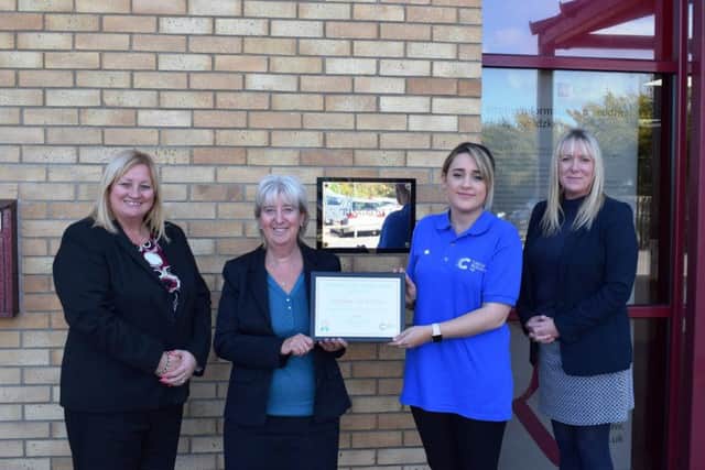 Maddy Simmons, of Cancer Research UK (second from right) with (from left) Ringrose Laws Tracey Garner, Lyn Townsend, and Sarah Spencer.