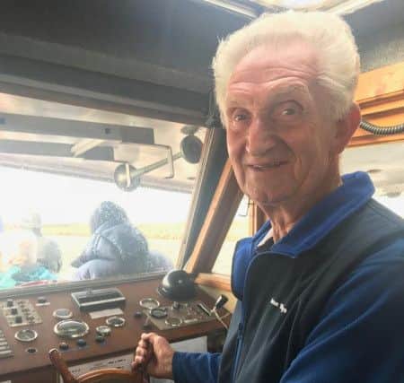 Skipper for the day, Rodney Bowles, has been taking trips on the Boston Belle for 26 years. ANL-180410-142112001