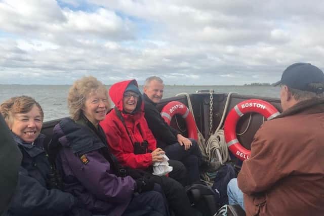 Birdwatchers get the best view on the Boston Belle. ANL-180410-142124001