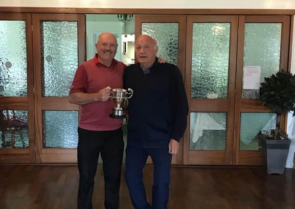 Foster Trophy winner Brian Smith pictured with Boston Golf Club president Pete Pearson. EMN-180510-114402002