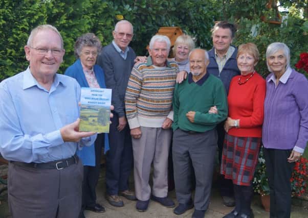 George Kinghorn, pictured  left holding the anthology, with some of the other members EMN-180910-084905001