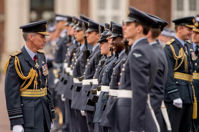 Air Chief Marshal Sir Stephen Hillier inspects the graduates on parade.