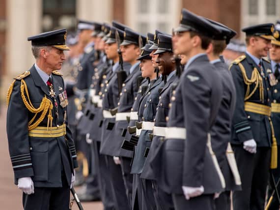 Air Chief Marshal Sir Stephen Hillier inspects the graduates on parade.