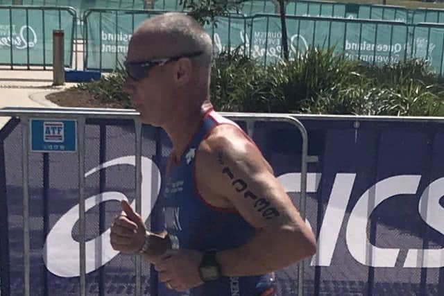 Richard Conway on his way to a brilliant PB and 47th overall at the world triathlon grand finals EMN-180810-093745002