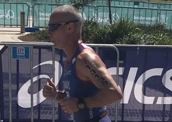Richard Conway on his way to a brilliant PB and 47th overall at the world triathlon grand finals EMN-180810-093745002