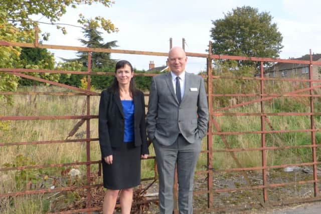 Trustee Claire Parker with Age UK Lindseys Chief Executive Officer Andrew Storer at the site for the  new HQ