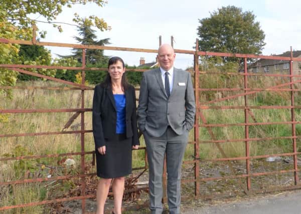 Trustee Claire Parker with Age UK Lindseys Chief Executive Officer Andrew Storer at the site for the  new HQ