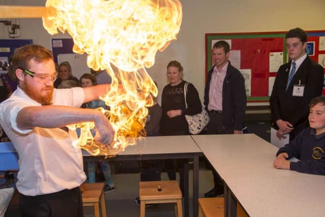 Science Teacher Tom Keningale demonstrates combustion at the Louth Academy open evening held recently. Photo Credit: Sean Spencer.