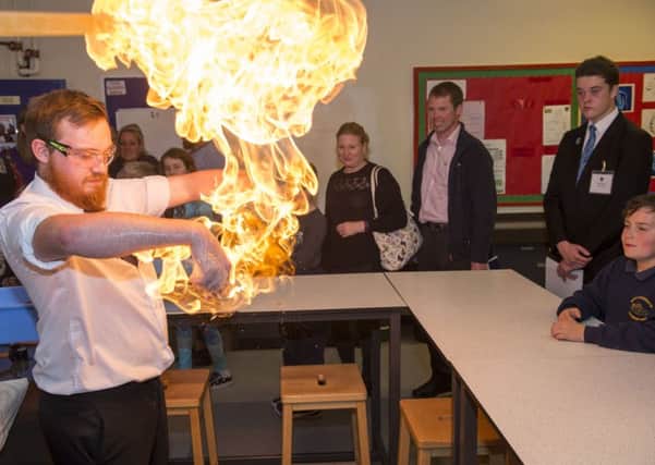 Science Teacher Tom Keningale demonstrates combustion at the Louth Academy open evening held recently. Photo Credit: Sean Spencer.