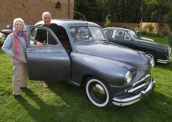 John and Margaret Smith of Old Leake with their 1952 Standard Vanguard 1A. EMN-180810-094847001