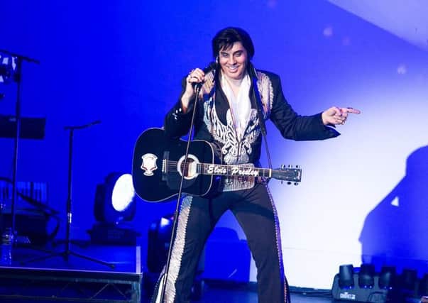 Mario Kombou is the King of Rock 'n' Roll in the Elvis Years at the Embassy Theatre. EMN-181010-141650001