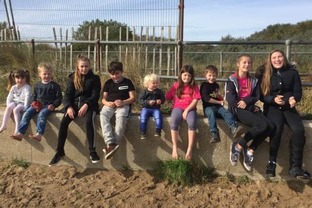 Phoebe Hope Vines with some of her friends and family.