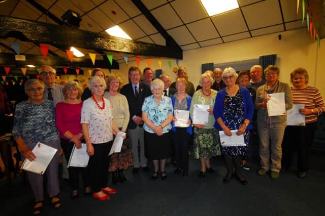 Volunteers and members receive their long service awards from Sleaford branch of the British Legion. EMN-181210-182920001