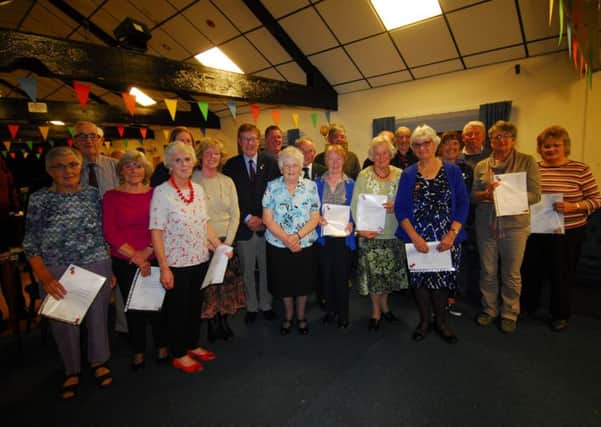 Volunteers and members receive their long service awards from Sleaford branch of the British Legion. EMN-181210-182920001