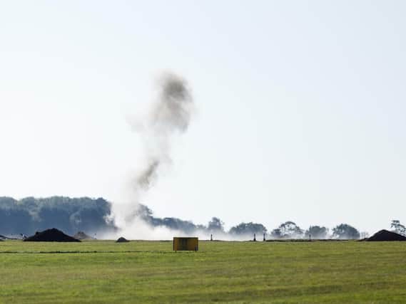An RAF bomb disposal team from RAF Wittering carried out a controlled explosion on the First World War 16lb bomb on RAF Cranwell airfield this morning.