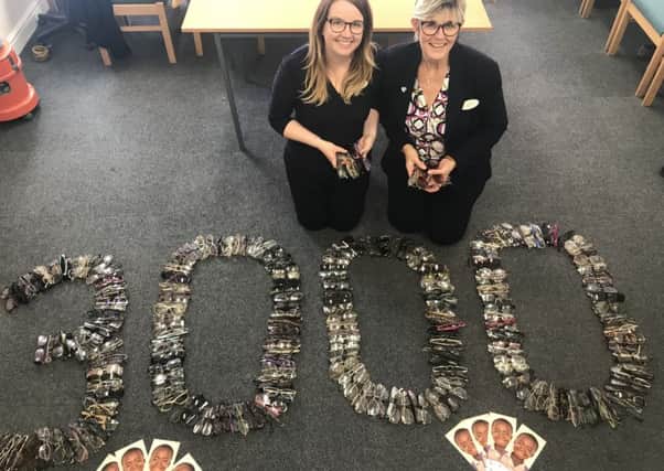 Laura Knox, assistant manager and Joanne Curtis, store director with some of the specs that have been collected.