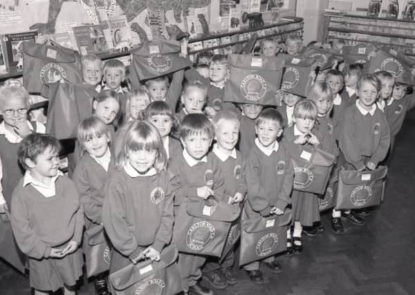 Pictured in this weeks Standard 20 years ago was this group of Carlton Road pupils. The children were given a special surprise when they arrived for their first day at school  each received a new book bag with the school log printed on the front.