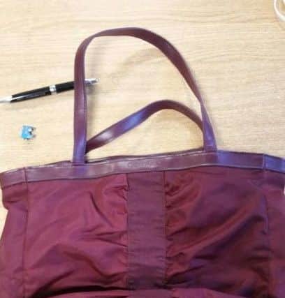Do you recognise the maroon handbag handed in to police that may have been lost in the Walcot or Osbournby area? EMN-181210-095407001
