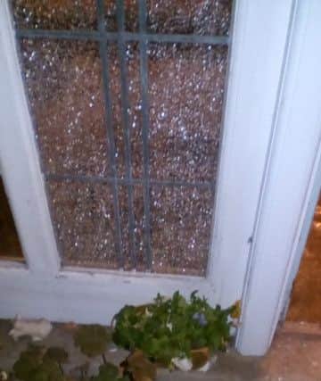 The pane of shattered glass in Beresford Avenie cost Â£350 to repair. ANL-181210-144329001
