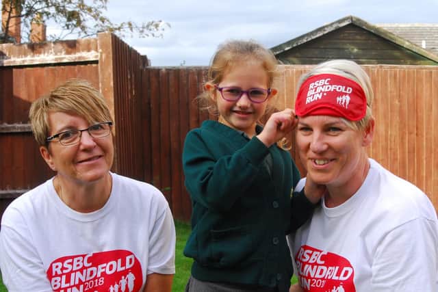 Amanda Mecklenburgh, Cheryl Coaton and her daughter Lily, 5.