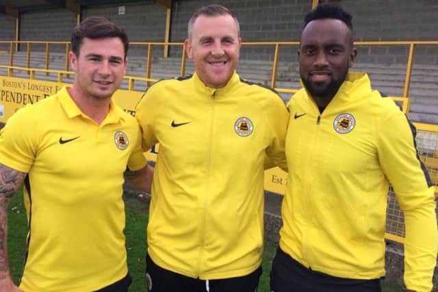 Josh Hine and Jordan Slew with Craig Elliott.