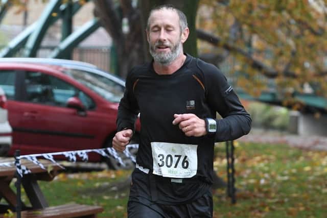 Runners of the Spires and Steeples Challenge finishing the marathan and half marathon, at Sleaford. 1st finisher of the half marathon, Dave Tilley of Boston. EMN-181015-155643001