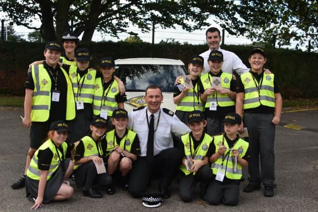 ACC Shaun West (centre) is pictured with the new recruits at Spilsby Primary Academy. ANL-181016-091434001